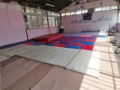 21راه اندازی سالن ورزش های رزمی و آمادگی جسمانی با نصب بیش از 200مترمربع تاتمی 2